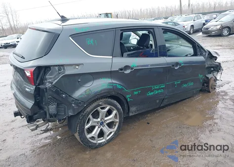 2019 Ford Escape Titanium z USA, uszkodzony, nr VIN 1FMCU9J91KUB74301